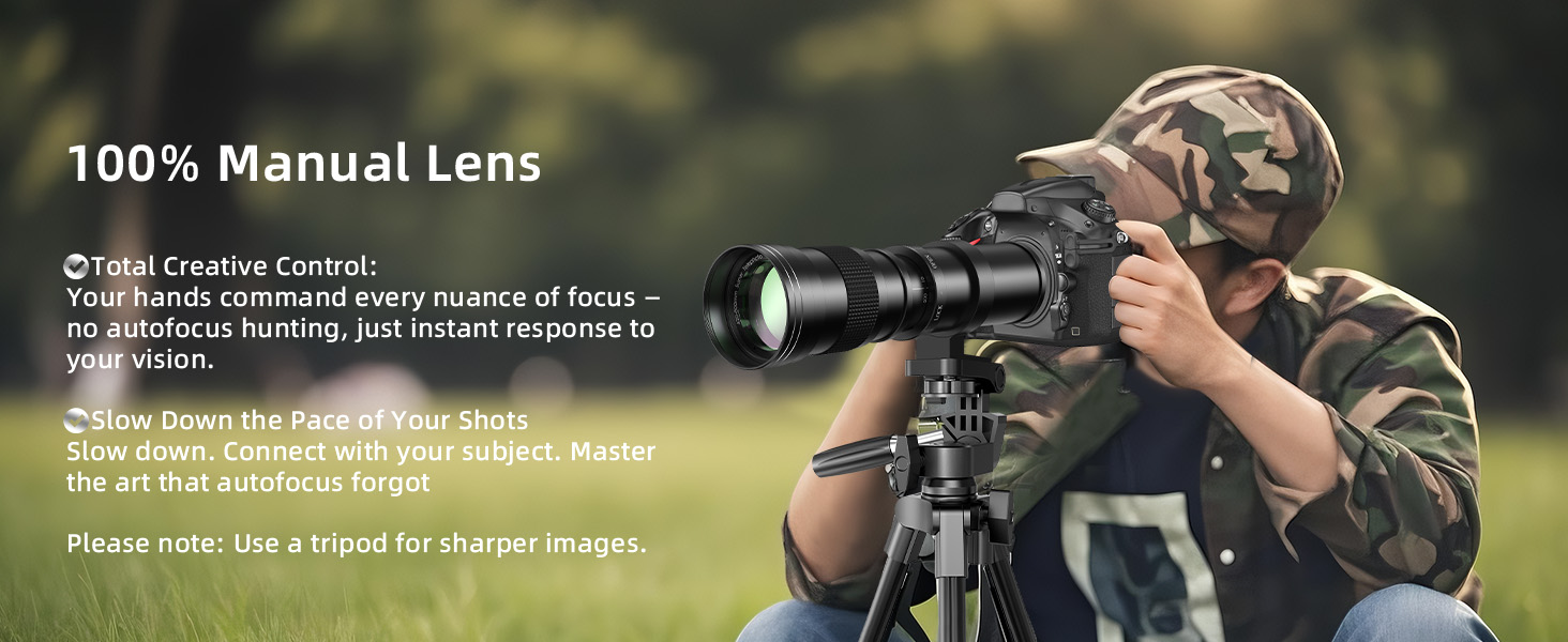 Text reads '100% Manual Lens'. Product photo showing telephoto camera lens against natural outdoor background.