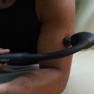 Man using the Backplus Massage Hammer on his bicep