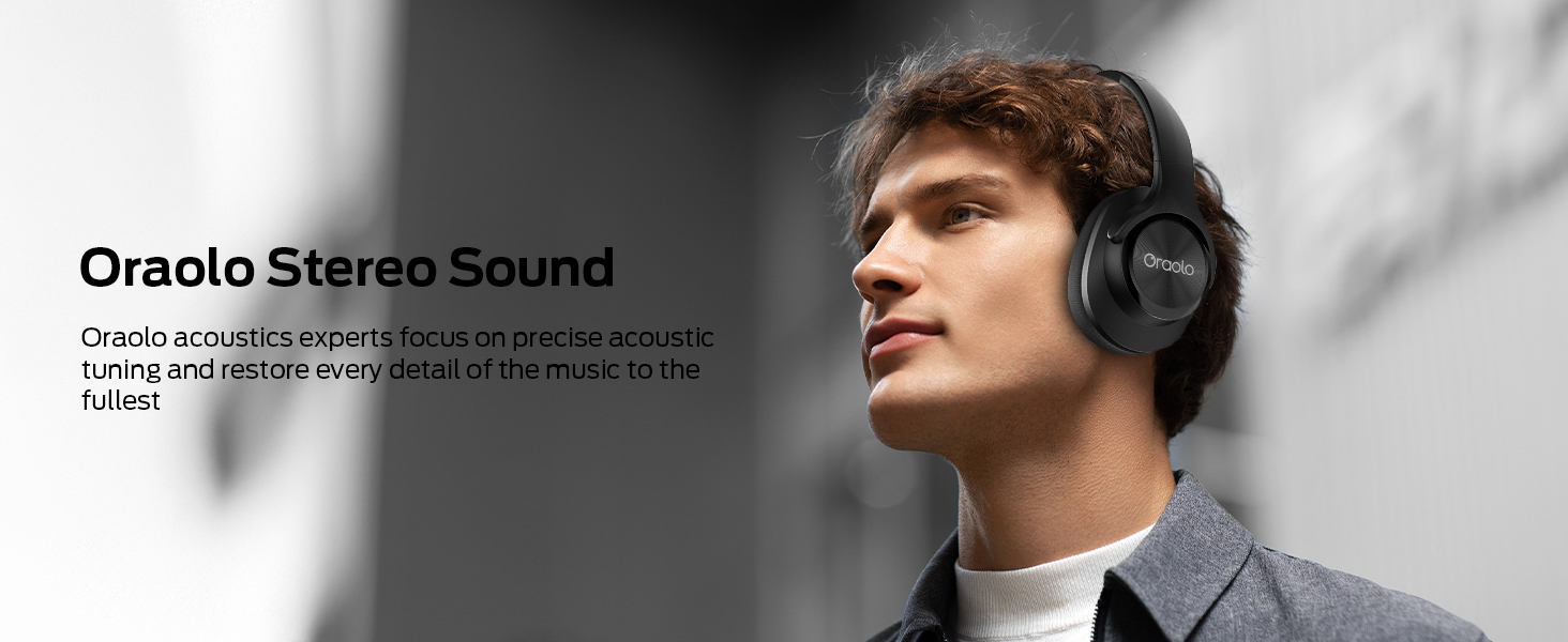 Text reads 'Otastic Stereo Sound'. Person wearing black over-ear headphones against grey background.