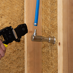 PEX Crimp inlet being installed with a crimp ring