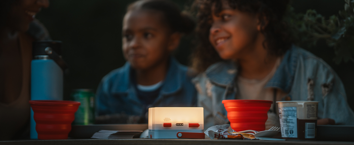 LED light on table with children smiling in background
