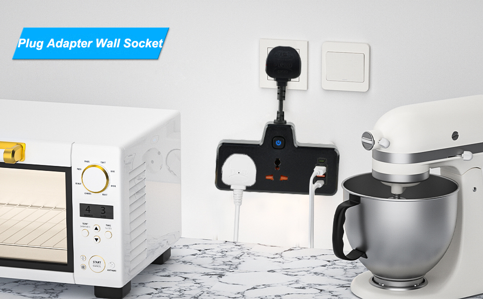 Black plug adapter with multiple sockets plugged into a wall outlet. Shown near a microwave and stand mixer on a kitchen counter.