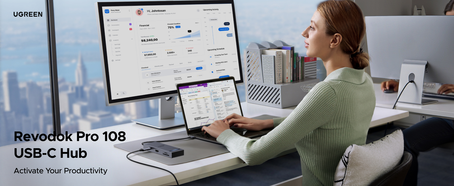 USB-C hub device shown on desk with person using laptop and monitor. Hub features multiple ports for connectivity. Product name 'Revodok Pro 108' visible.