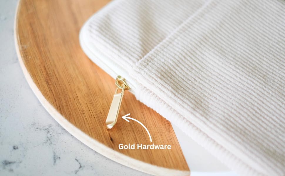 beige corduroy kindle sleeve close up featuring gold hardware