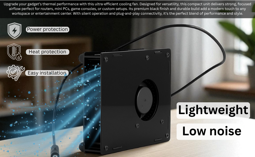 Black compact blower fan on table with airflow effect,