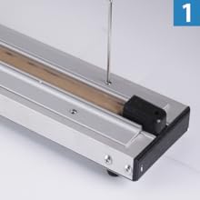 電熱線を交換：①高温布に押し付けている鉄板のネジを外し、高温布を外す