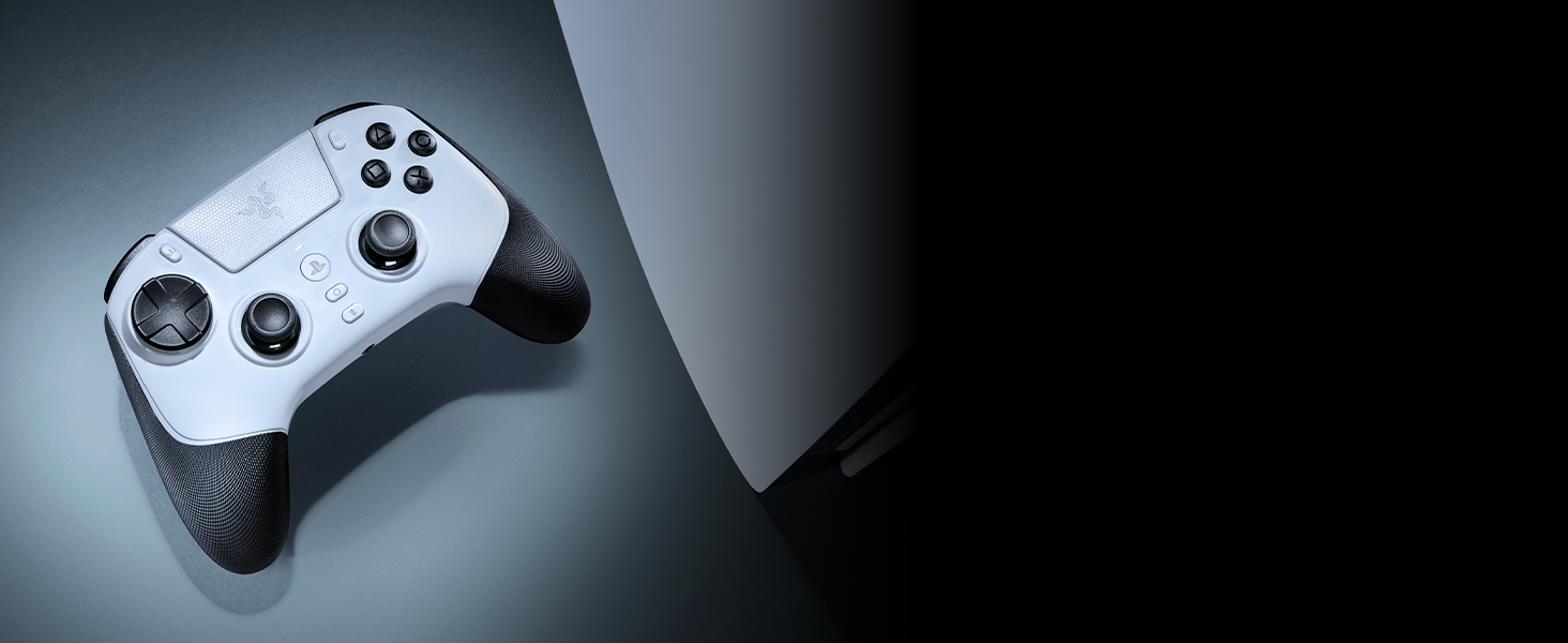 Gaming controller or device shown in dark lighting conditions with glowing elements or LED indicators visible.