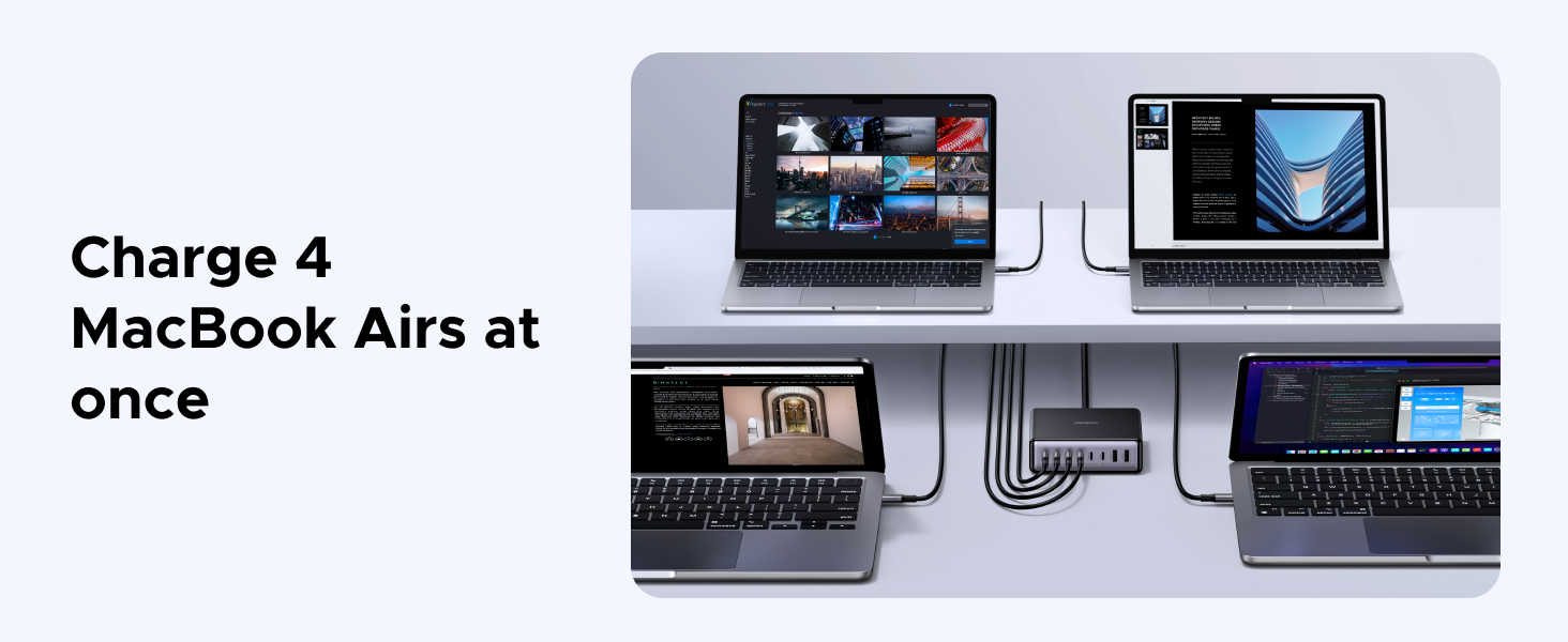Four MacBook Air laptops connected to a multi-port charging hub, demonstrating simultaneous charging capability. Laptops display various screens, showcasing versatility in use.