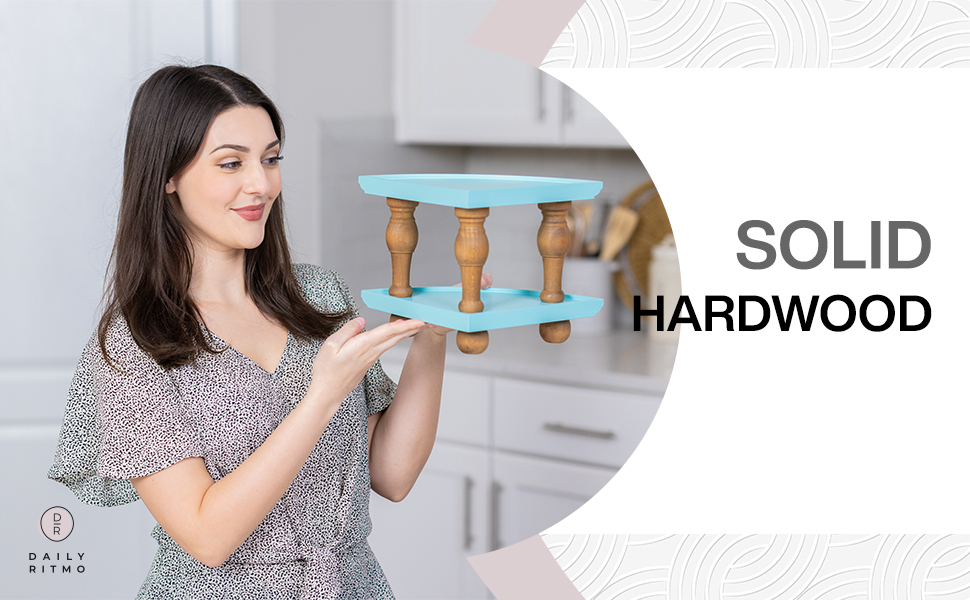 Daily Ritmo aquamarine wood counter corner shelf held by a woman