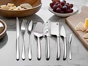 Silver cheese knives forks spoons