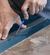 Scratch Awl being used to score a steel sheet