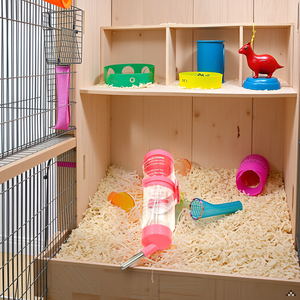 A cozy pet corner with a soft blanket and the product placed on a wooden surface.