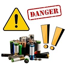 Various kinds of batteries and caution danger signs