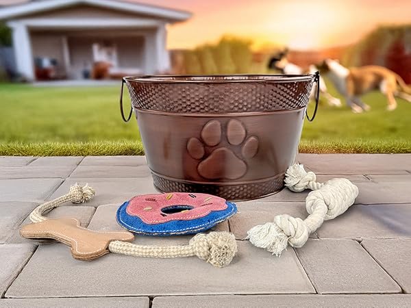 Metal dog toy box with paw print design, plus dog chew toys for aggressive chewers.