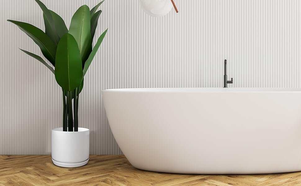 white ceramic plant pot in bathroom