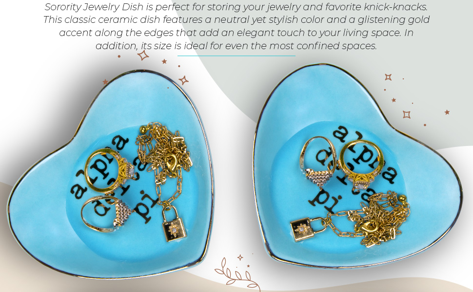 Image of Alpha Delta Pi Sorority ring dish with rings and a necklace.