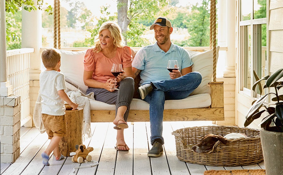 Interior photo of Jenny and family on front porch