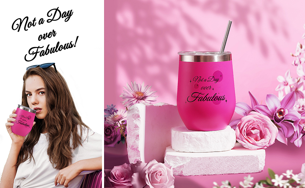 Pink cups and straws surrounded by pretty flowers and decorative blocks