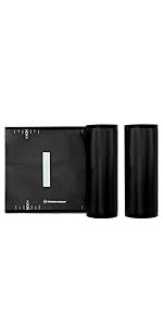 Black and Clear vacuum bag roll standing next to one slightly unrolled