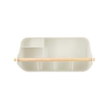 White plastic organizer tray with multiple compartments of varying sizes. Features a wooden rod across the top, likely for hanging or carrying.