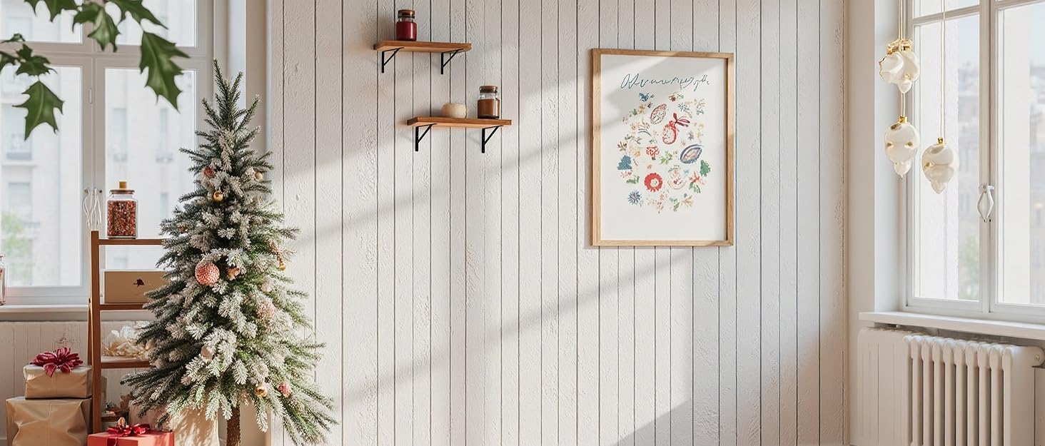 A Christmas living room features a blank wall with two wooden brackets holding displayed items.