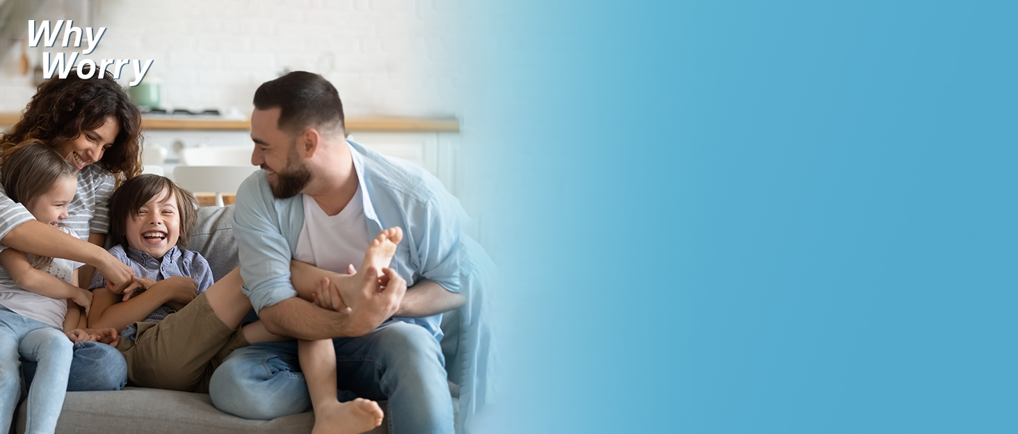Family sitting on a couch in a living room setting, with parents and two children interacting happily. Blue background occupies half the image.