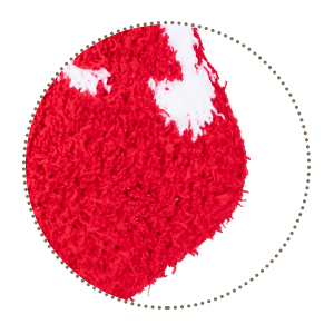 Close-up of red fuzzy or fluffy material with white circular pattern. Texture resembles soft fabric or carpet.