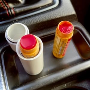 chapstick keychain thats vacuum insulated to prevent lip balm from melting