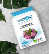 White supplement bottle with blue lid on product packaging. Label shows 'Rhodiola' and mentions stress support. Green leaves and purple flower in background.