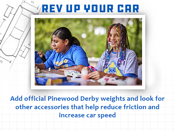 Rev up your car text , two girls smiling, adding weight to the wooden car