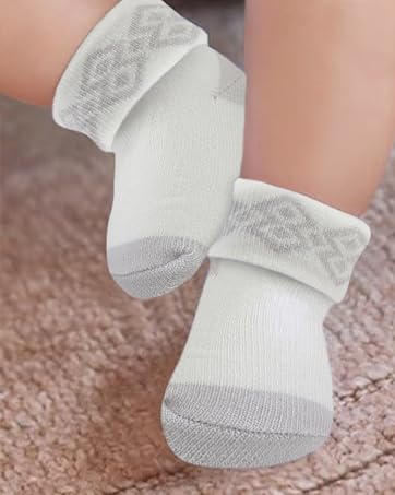a pair of white socks with a grey pattern on the side.