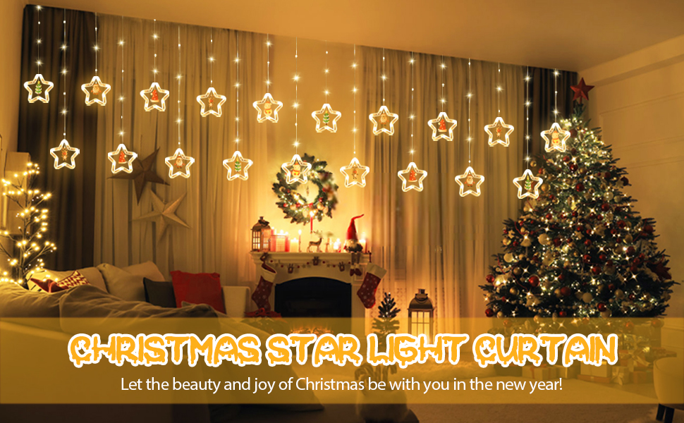 Star-shaped LED light curtain for Christmas decor. Warm white lights hang in front of sheer curtains. Christmas tree and wreath visible in cozy room setting.