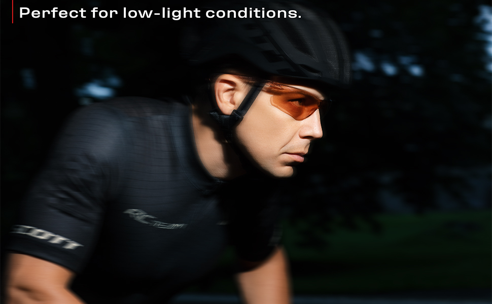 A guy cycling in the almost dark (not that late in the evening) while wearing our NoCry glasses.