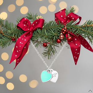 A close-up view of a heart-shaped pendant necklace lying on a wooden surface, with a soft natural li