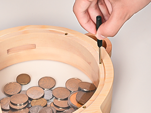 Personalized wooden piggy bank with a child's name, a special touch that makes it unique