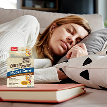 Nature's Jeannie, Woman resting on couch with mucus care.