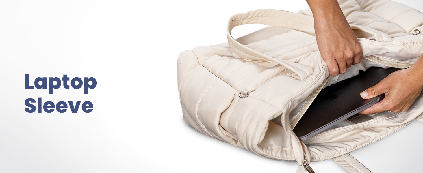 Hands placing laptop into sleeve inside beige puffer tote