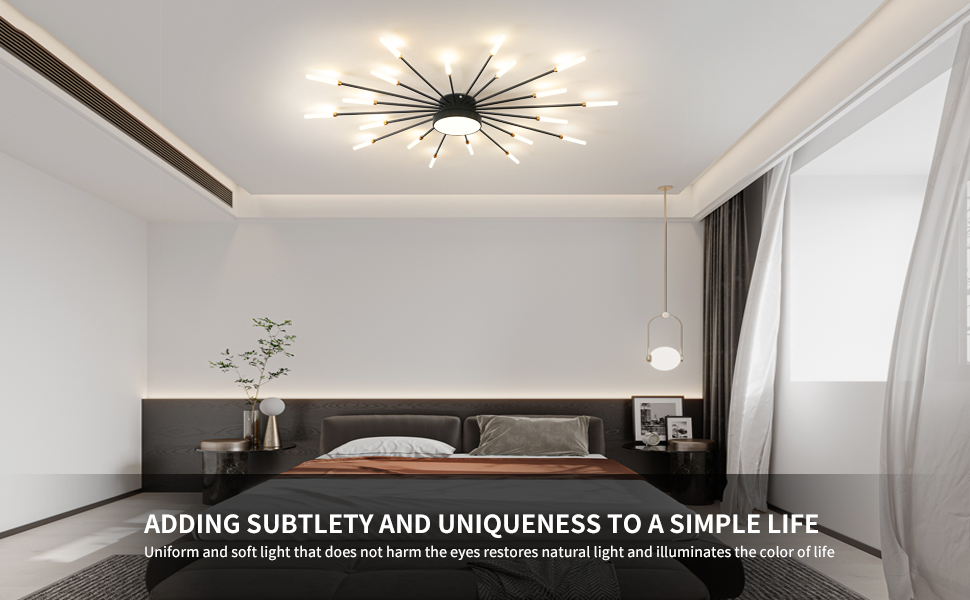 Modern minimalist bedroom with star-burst ceiling light fixture, grey bedding, white walls, and decorative plant in corner.