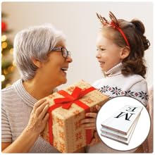 Elderly woman and girl with antlers laugh, holding gift, &amp;amp;#34;HOME&amp;amp;#34; blocks inset.