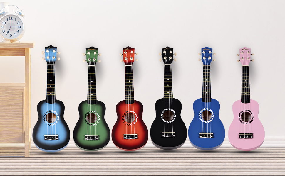 Six colorful ukuleles arranged in a row, featuring blue, green, red, black, royal blue, and pink finishes, displayed against white wall.
