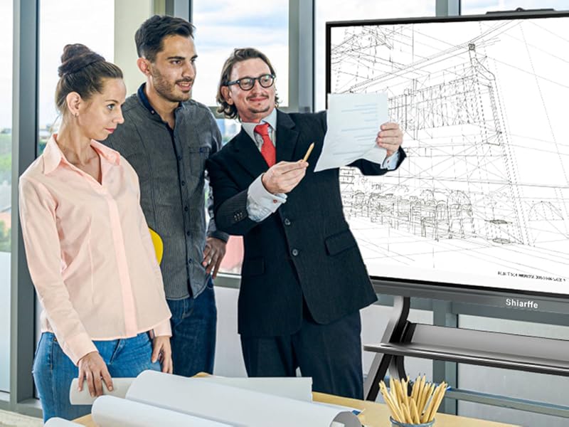 A designer is presenting and recommending their design ideas to the client using the Smart Board