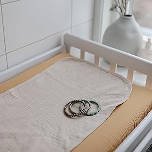 Chaning pad liner on table