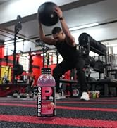 protein sports drink with athlete working out in the background with medicine ball