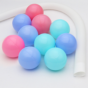 Bonus play balls and drainage pipe included with portable kids paddling pool