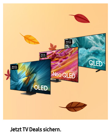 Der Text lautet „Bild 4“. Marketing-Display mit mehreren schräg angeordneten QLED-TV-Bildschirmen, die vor einem pfirsichfarbenen Hintergrund mit Herbstblättern lebendige Anzeigemöglichkeiten bieten.