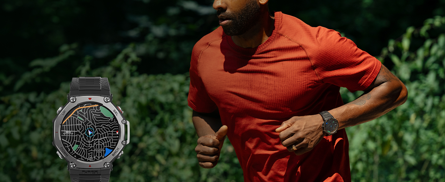 A person wearing a red athletic shirt is running outdoors in a green, lush environment, with an Amazfit T-Rex 3 rugged smartwatch on their wrist. The watch, displayed in a close-up on the left, features a black strap and shows a detailed map with a running route, highlighting its GPS and navigation capabilities. The watch’s durable design and clear display emphasize its suitability for outdoor fitness activities like running.