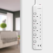 power strip with a white wall outlet
