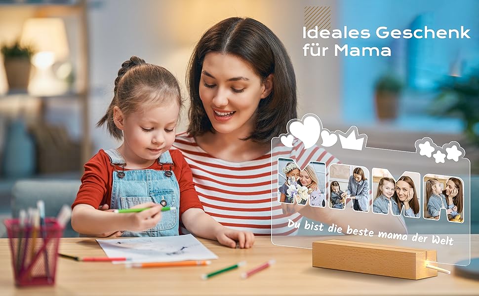 Wooden photo display with multiple illuminated picture frames. Text in German suggests it's a gift for mothers. Woman and child interacting with the product.