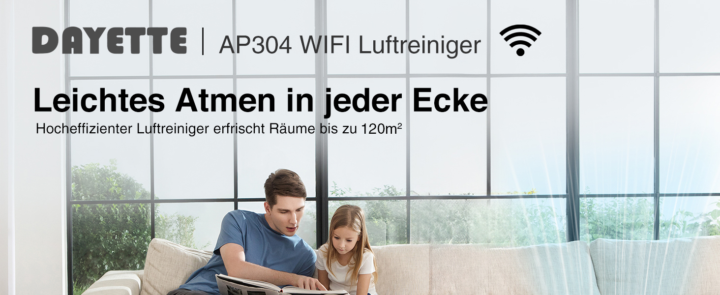 en mand og en pige, der sidder på en sofa med en bærbar computer.