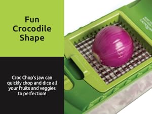 Easy to use green crocodile shaped veggie chopper. 